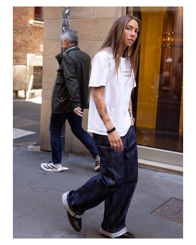 I love this first shot so much but I was going to have to crop the image to fit the IG grid proportion so instead I added a bit of boarder to save all the look! I love the mix of beauty, attitude and the slouchy (but not sloppy) silhouette! Slide 2 is obvious and (of course) I’m bias of the great style of slide 3 (she’s sooo chic!) Two shots of the same look for 4&5 bc (again) the slouchy not sloppy men’s shirt and the high-rolled sleeves just look so good from every angle! 6& 7 (again) is obvious high-level style! 8 I’m not a huge Miyake fan but I see so many people looking so good in it! The hair for 14 and 10 and 17 making a case for Summer Sand colored suits! Milano (of course!) by @thesartorialist