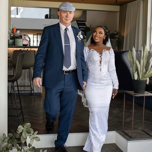 Rose and her husband👸🏾🤴🏼I use datinh app long time ago when i was in my coumtry Tanzania i mever get serious man but once i come here as to work i meet this man on tiktok and its not dating he jist use to like my post and comment and at the end of the day we start to talk messenger and thrn we plan to meet Later we start dating and thrn until we got married We datr for 7month. @rose.oscar.1690 Congratulations darling 🎉😘Wish you happy forever 😘🥰🙏🏾🤎❤️🩷🧡💚💛🩶🤍💙🖤🩵...#interracial #interracialcouple #wedding #whitemendatingblackwomen #lovehasnocolor by @whitemendatingblackwomenclub