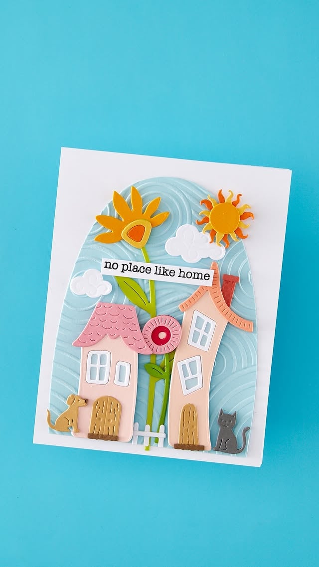 Tiny houses, big charm! 🏡✨ Watch this sweet Whimsical Village card come together with playful dies, sunny details, and storybook layers made for happy mail. 💌 Save this for your next cardmaking session and follow us for more creative inspiration, cardmaking ideas, and new project tutorials! #cardmaking #papercraft #vickypapaioannou #handmadecards by @teamspellbinders