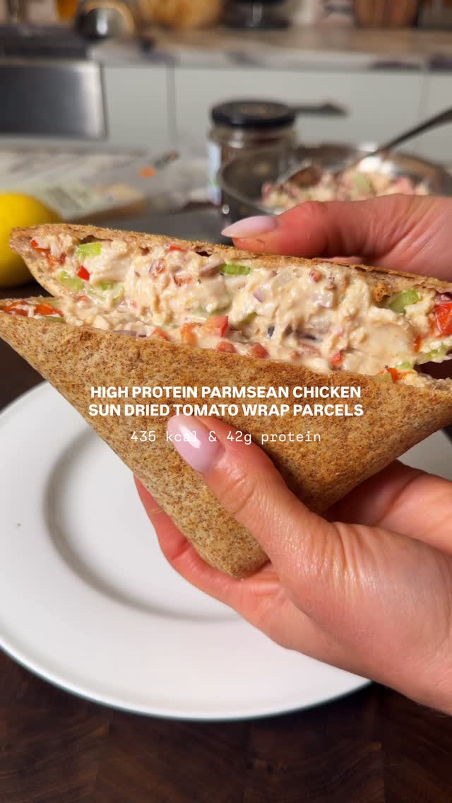 HIGH PROTEIN PARMESAN CHICKEN SUN DRIED TOMATO WRAP PARCELS
 Once you’ve prepped a tub of this in the fridge, weekday lunches are sorted. This one is creamy, crunchy, a little spicy and slightly sweet, and works well in wraps, pitta, sandwiches or spooned over salads. Keeps for 3-4 days in the fridge. 

approx 435 kcal & 42g protein

You will need to serve 2
 160g cooked chicken breast 5 sun dried tomatoes, drained and diced 25g grated parmesan 2 sticks of celery 1/2 red onion, diced 1/2 red pepper, diced 1 tsp garlic granules Few splashes of Tabasco 1 tsp honey Salt and pepper 2 big heaped tbsp cottage cheese 2 wraps of choice 

Finely dice the celery, red onion, red pepper and sundried tomatoes. Mix with chicken, cottage cheese, parmesan, garlic granules, Tabasco, honey, salt and pepper. If it’s looking abit dry add more cottage cheese.  
Place into the centre of a wrap and fold inwards then fold the sides in to form a parcel. Air fry at 210 or pan fry until lightly toasted. If you over toast the mix will go soggy! 

#healthyrecipes #healthyfood #mealprep