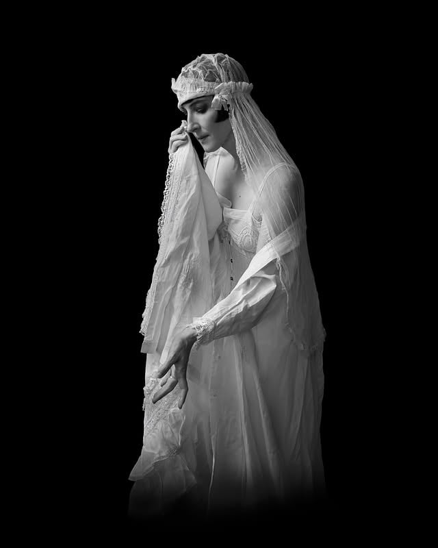 A transformation into a Victorian ghost version of me haunting an Edwardian version of John. I wear a ca. 1885 corset and underpinnings with ca. 1875 robe from @antique_gown; John wears original Edwardian morning dress ensemble. This is Live Spirit Photography — a 19th century technique brought back to life by @rarebitproductions, a special project by @rcallahanphoto and @kellfirebray. The ancient Egyptians believed that spirits could continuously interact with the living, so a distinct category of being like our “ghost” would be unnecessary for them. Everyone had multiple spirits or souls, including the ba and the ka. The ba-soul is depicted with a human head—your head—on a bird’s body, signifying mobility, the ability of the soul to travel with the sun god through heaven and the Underworld. The ka-spirit is a person’s double, which remains in the tomb and is nourished with offerings brought by family members or dedicated priests. Ba-souls could also go bad and attack the living. One of the ways you could defend yourself from a rogue ba-soul was to write a letter to a dead relative asking them to take the offending spirit to court before Osiris.
.
If you’d like to sit for your own portrait with a specter of your choosing (including me or John!), they are offering a rare one-day session at @odditiesfleamarket in Bridgeport CT on June 13. Every apparition is conjured in-camera using the Pepper’s Ghost method. No Photoshop. No retouching. Only a little help from the beyond.
.
This portrait was made at the historic Stoughton House, with decor by @justinfornal.

#spiritphotography #peppersghost #victorianghost #victorianfashion #edwardianfashion